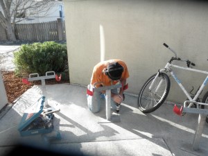 Bob Ornelas installing bicycle rack at Arcata Chamber of Commerce.